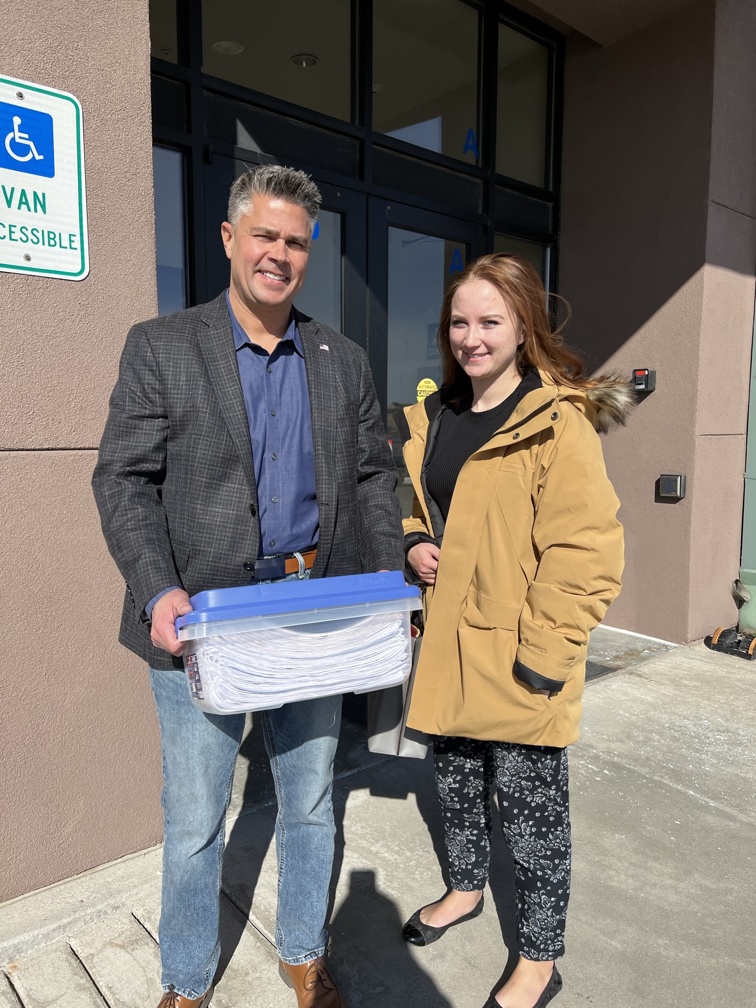 Turning in petition signatures with daughter